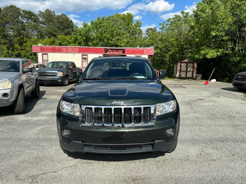 2011 Jeep Grand Cherokee for sale at REDLINE AUTO SALES in Durham NC