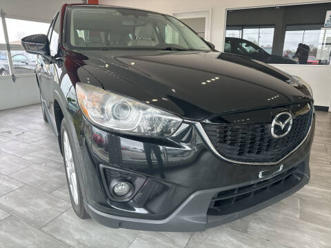 2013 Mazda CX-5 for sale at Evolution Autos in Whiteland IN