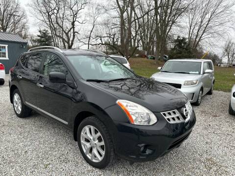 2012 Nissan Rogue for sale at Lake Auto Sales in Hartville OH