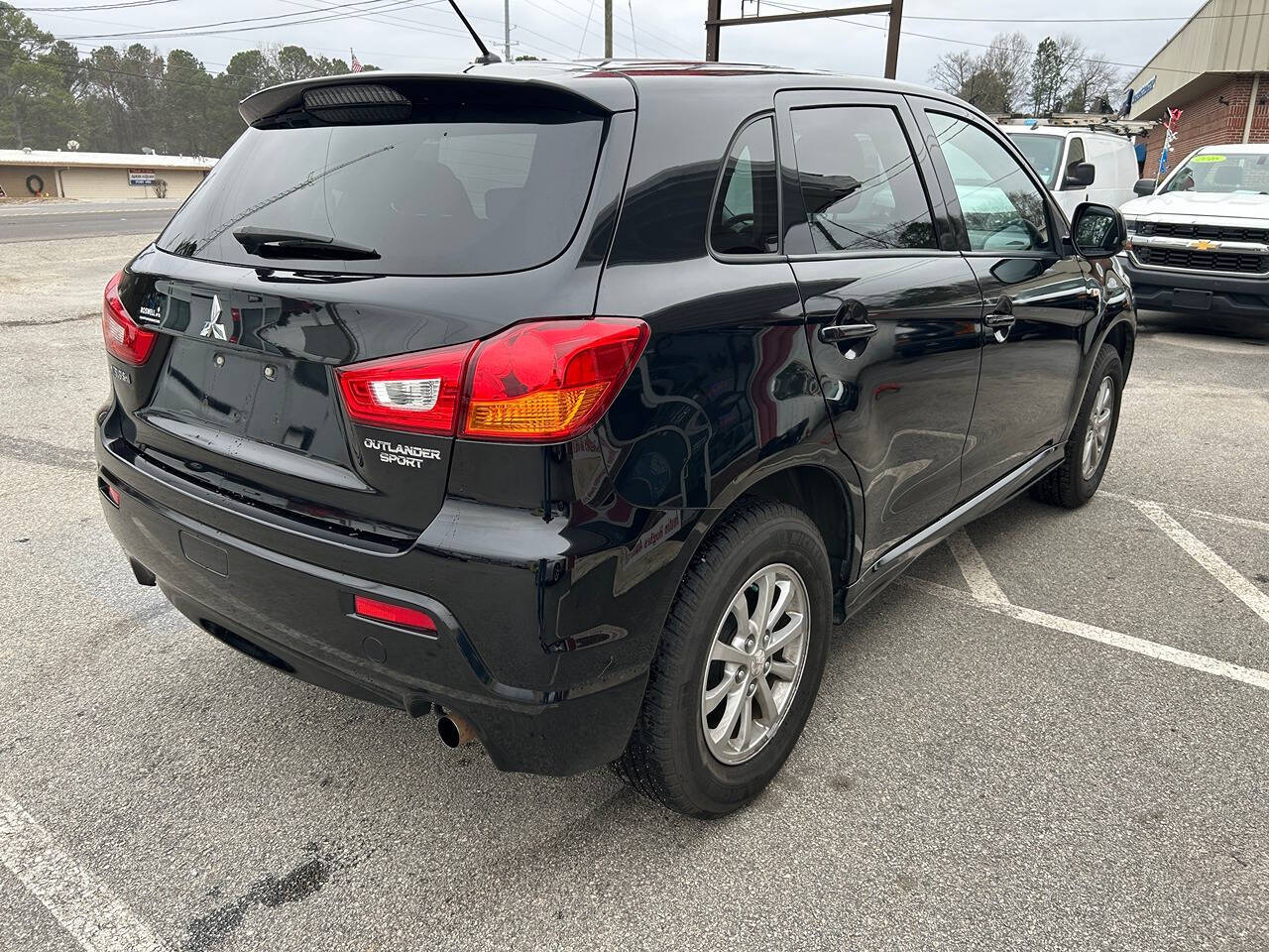 2012 Mitsubishi Outlander Sport for sale at Justin Hughes Auto Group LLC in Douglasville, GA