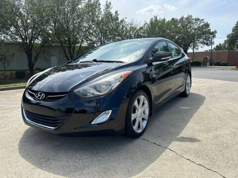 2013 Hyundai Elantra for sale at Triple A's Motors in Greensboro NC