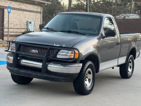 2003 Ford F-150 for sale at Two Brothers Auto Sales in Loganville GA