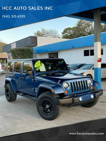 2010 Jeep Wrangler Unlimited for sale at HCC AUTO SALES INC in Sarasota FL