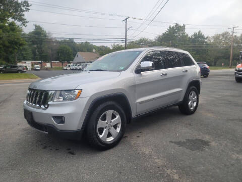 2011 Jeep Grand Cherokee for sale at Hometown Automotive Service & Sales in Holliston MA
