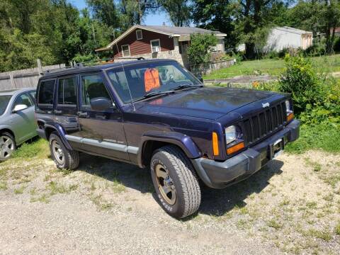 1999 Jeep Cherokee for sale at Northwoods Auto & Truck Sales in Machesney Park IL