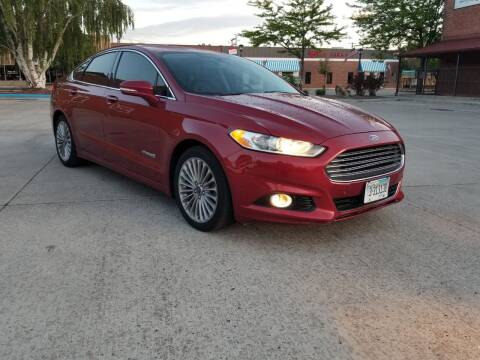 2013 Ford Fusion Hybrid for sale at KHAN'S AUTO LLC in Worland WY