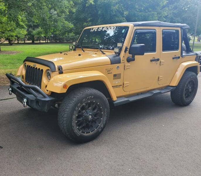 2014 Jeep Wrangler Unlimited for sale at Smith's Cars in Elizabethton TN