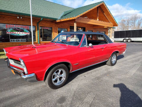 1965 Pontiac GTO for sale at Ross Customs Muscle Cars LLC in Goodrich MI
