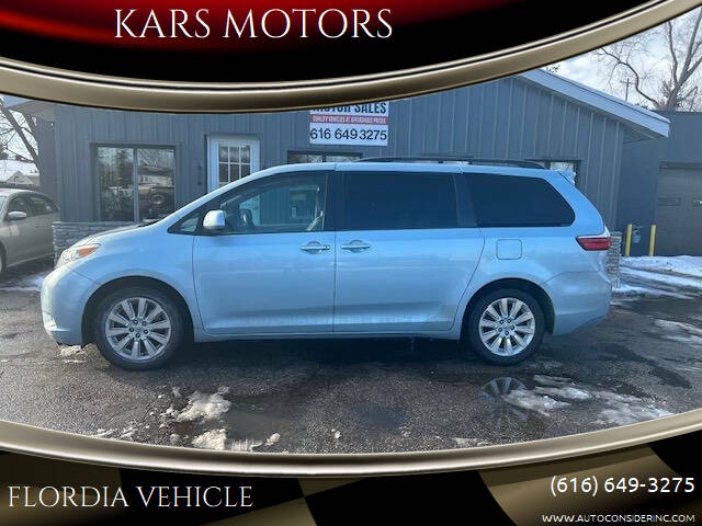 2015 Toyota Sienna for sale at KARS MOTORS in Wyoming MI