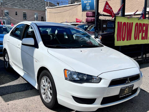 2013 Mitsubishi Lancer for sale at King Of Kings Used Cars in North Bergen NJ