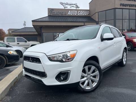 2014 Mitsubishi Outlander Sport for sale at FASTRAX AUTO GROUP in Lawrenceburg KY