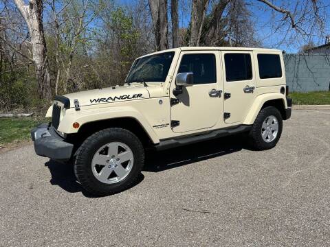2011 Jeep Wrangler Unlimited for sale at Family Auto Sales llc in Fenton MI