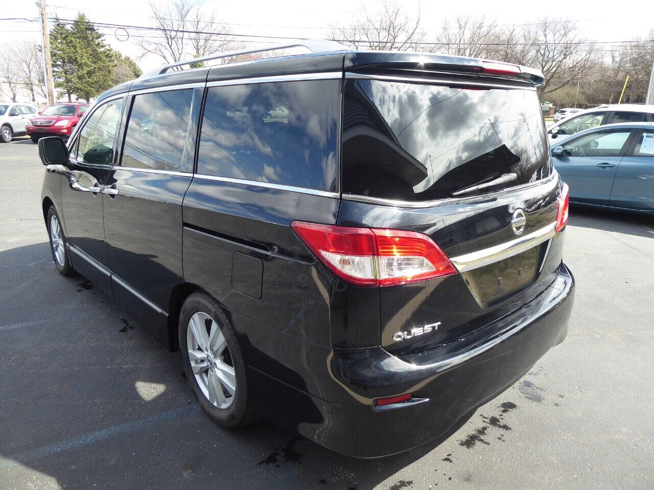 2014 Nissan Quest for sale at Lakeshore Autos in Holland, MI