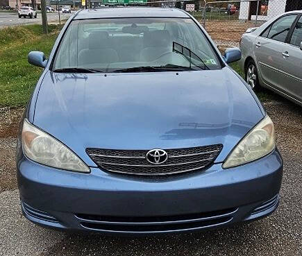 2003 Toyota Camry for sale at Art's Used Cars in Winfield, WV