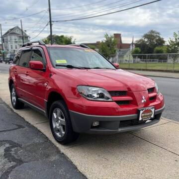 2003 Mitsubishi Outlander for sale at A & J AUTO GROUP in New Bedford MA