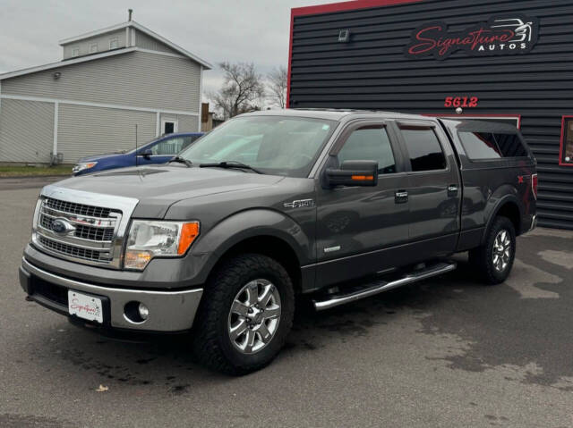 2014 Ford F-150 for sale at SIGNATURE AUTOS LLC in Weston, WI