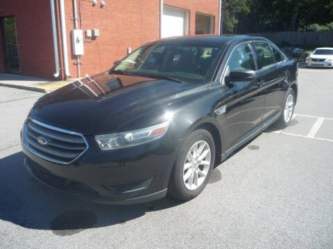 2014 Ford Taurus for sale at Credit Cars LLC in Lawrenceville GA