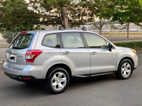2014 Subaru Forester for sale at Rynok Auto Sales LLC in Auburn WA