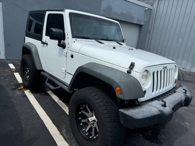 2011 Jeep Wrangler for sale at Amico Auto Sales in Margate, FL