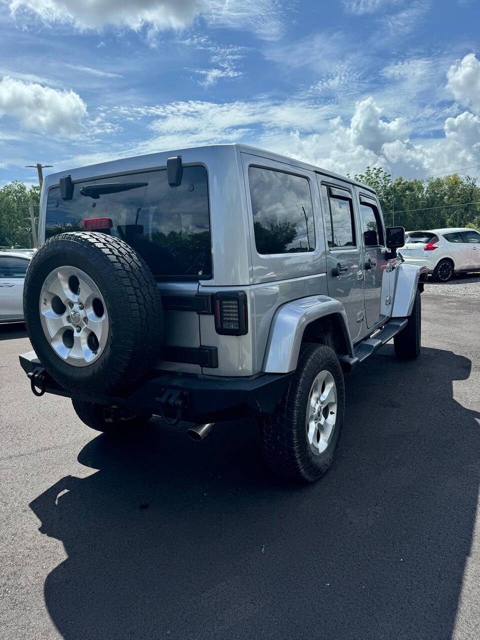 2014 Jeep Wrangler Unlimited for sale at PLANTATION MOTORS in Tampa, FL