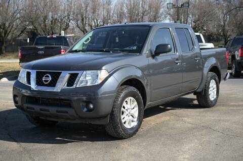 2014 Nissan Frontier for sale at Low Cost Cars North in Whitehall OH