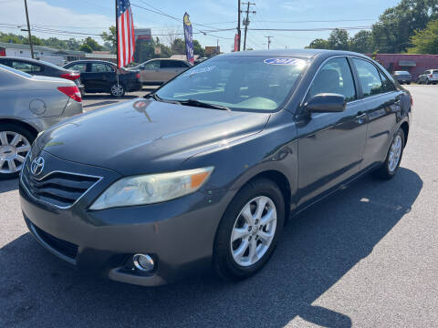 2011 Toyota Camry for sale at Cars for Less in Phenix City AL