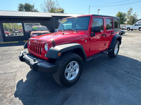 2015 Jeep Wrangler Unlimited for sale at VILLAGE AUTO MART LLC in Portage IN