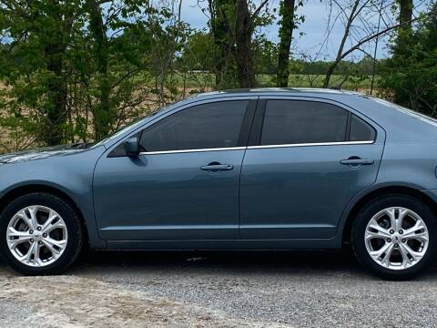 2012 Ford Fusion for sale at RAYBURN MOTORS in Murray KY