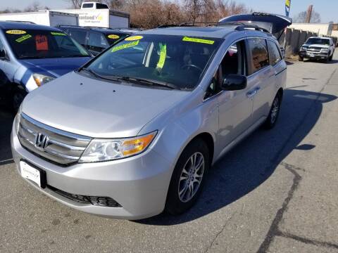 2011 Honda Odyssey for sale at Howe's Auto Sales in Lowell MA