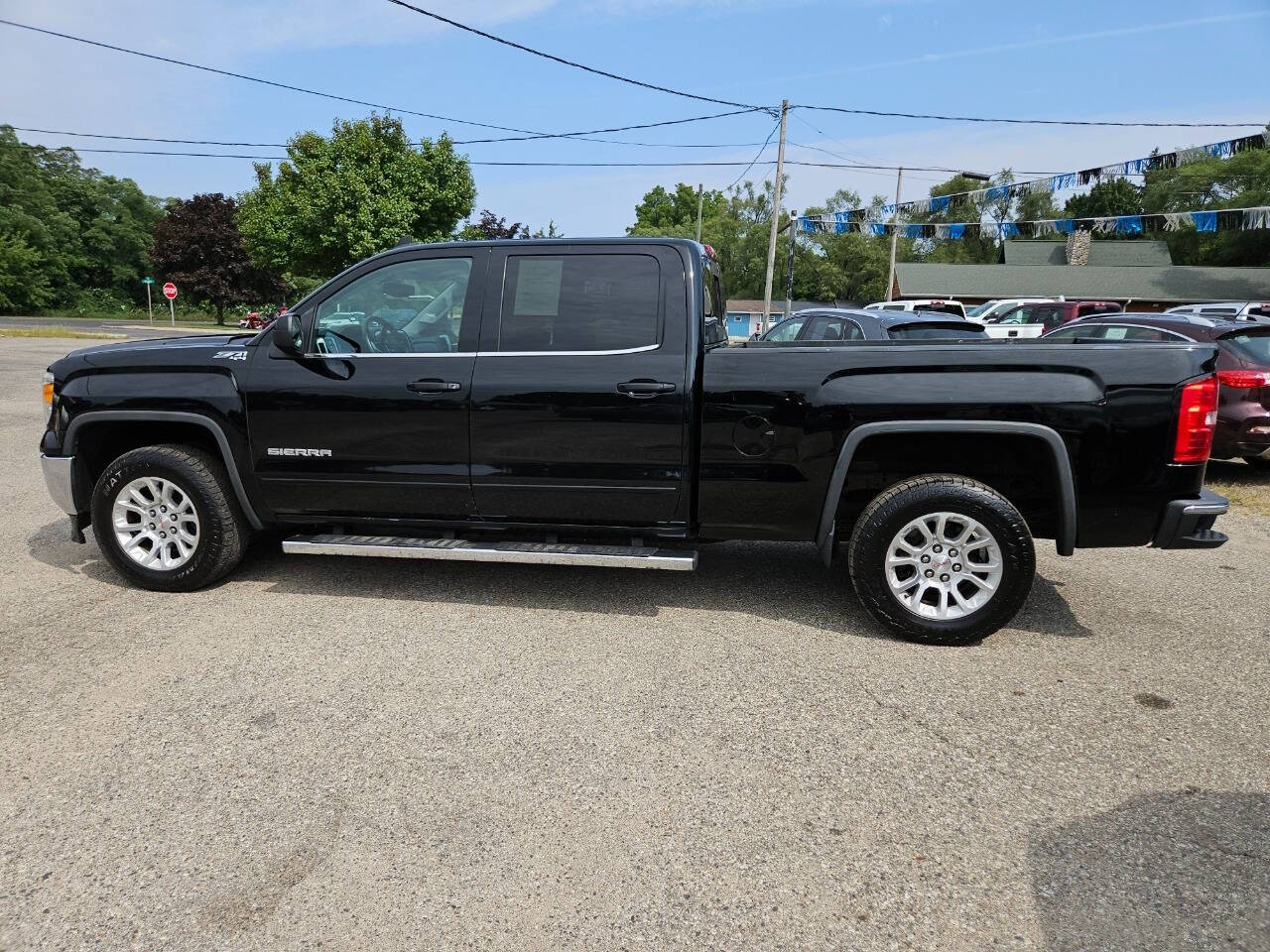 2015 GMC Sierra 1500 for sale at DANGO AUTO SALES in HOWARD CITY, MI