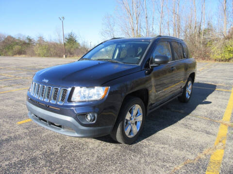 2011 Jeep Compass for sale at Caruzin Motors in Flint MI