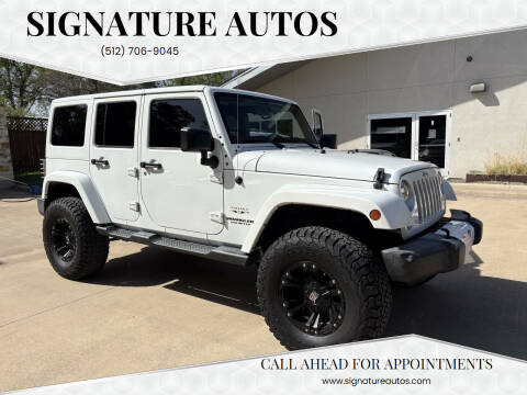 2016 Jeep Wrangler Unlimited for sale at Signature Autos in Austin TX