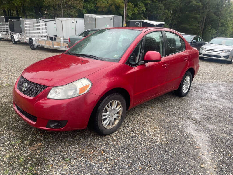 Used 2012 Suzuki SX4 Sedan LE with VIN JS2YC5A30C6303951 for sale in Penn Run, PA