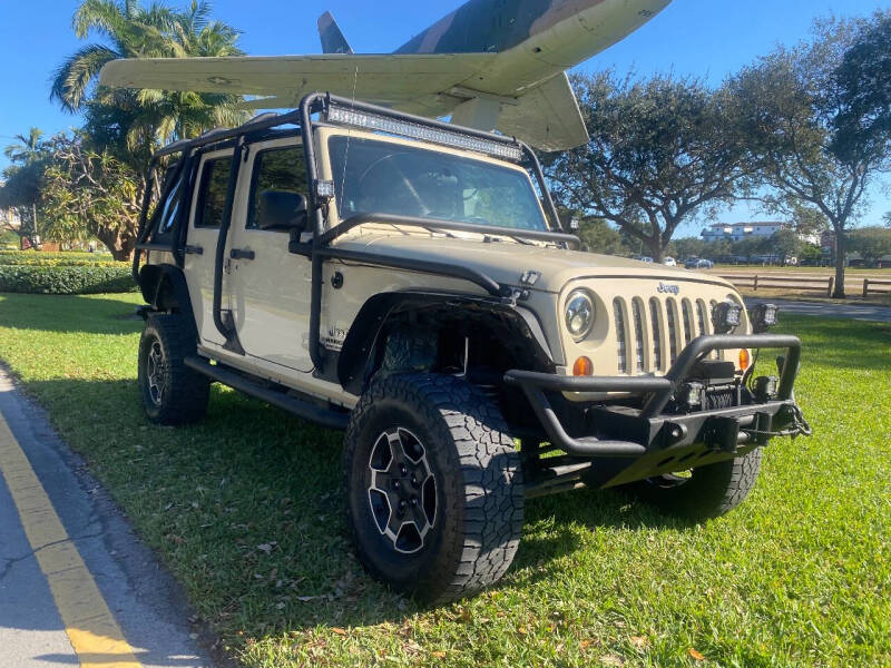 2011 Jeep Wrangler Unlimited for sale at BIG BOY DIESELS in Fort Lauderdale FL