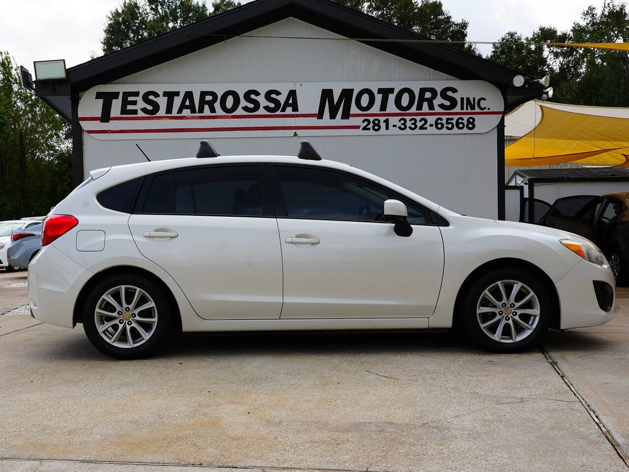 2014 Subaru Impreza for sale at Testarossa Motors in League City, TX