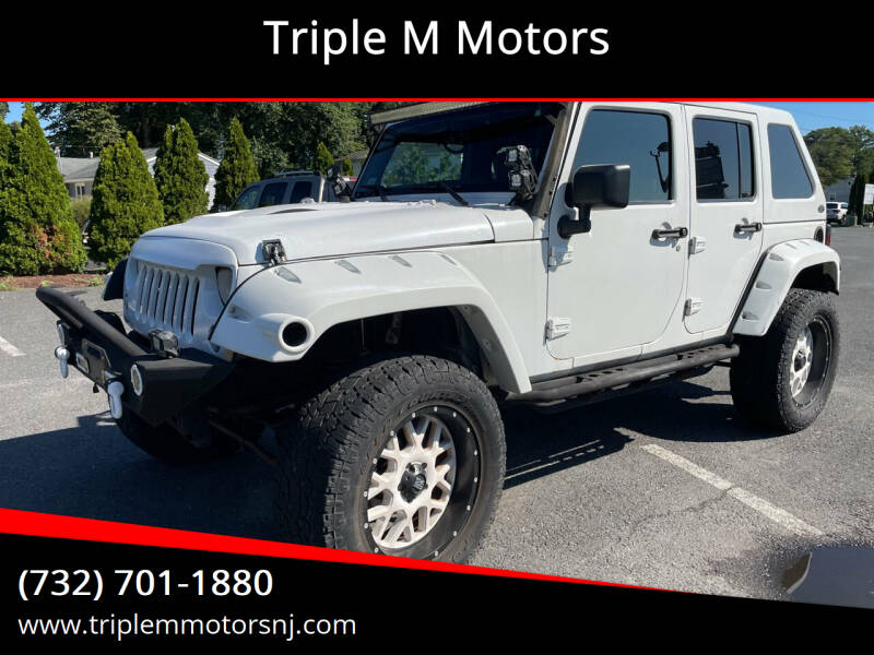 2014 Jeep Wrangler Unlimited for sale at Triple M Motors in Point Pleasant NJ