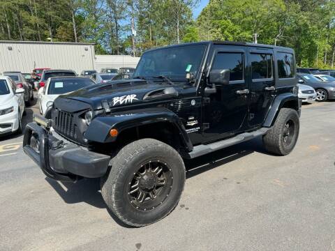 2014 Jeep Wrangler Unlimited for sale at GEORGIA AUTO DEALER LLC in Buford GA
