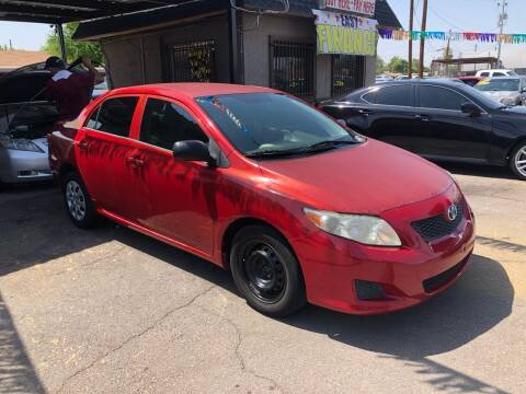 2009 Toyota Corolla for sale at Valley Auto Center in Phoenix AZ