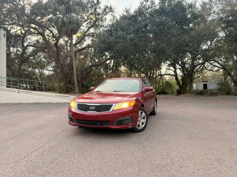 2009 Kia Optima for sale at Carnaval Auto Group LLC in Tampa FL