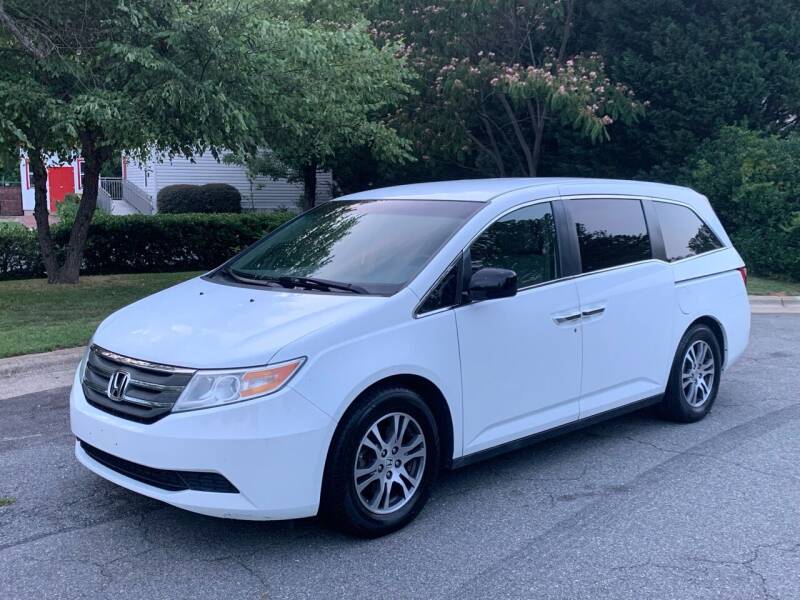 2011 Honda Odyssey for sale at Triangle Motors Inc in Raleigh NC