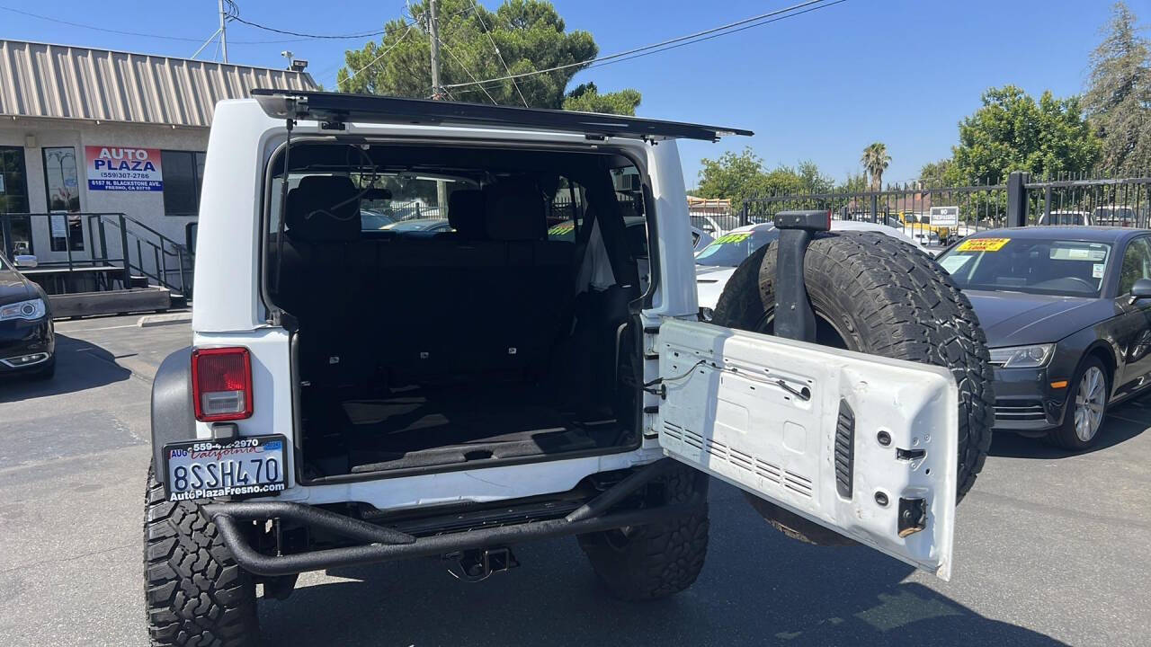 2012 Jeep Wrangler Unlimited for sale at Auto Plaza in Fresno, CA