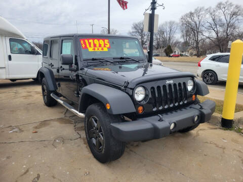 2013 Jeep Wrangler Unlimited for sale at Madison Motor Sales in Madison Heights MI