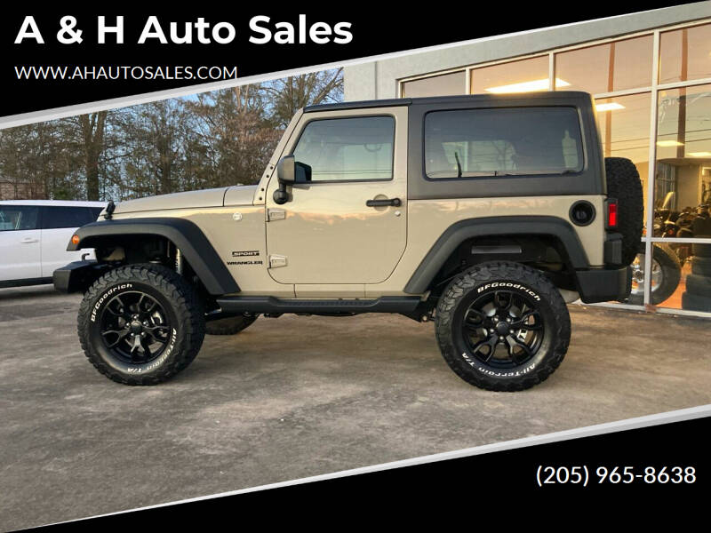 2017 Jeep Wrangler for sale at A & H Auto Sales in Clanton AL