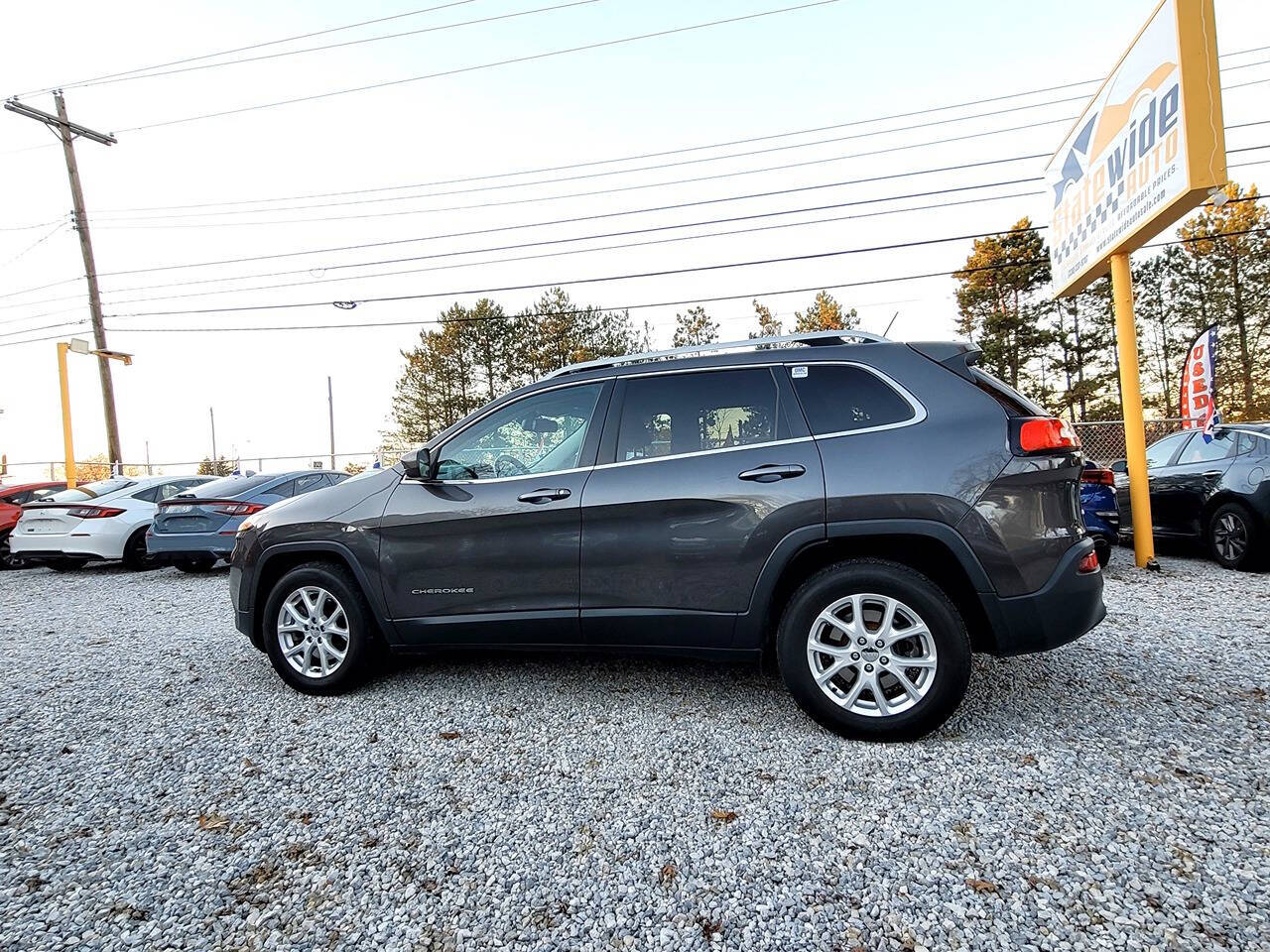 2015 Jeep Cherokee for sale at Statewide Auto LLC in Akron, OH