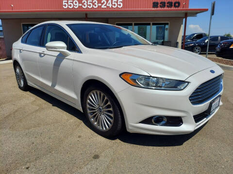 2015 Ford Fusion for sale at Credit World Auto Sales in Fresno CA