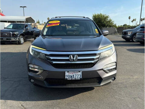 2016 Honda Pilot for sale at Armando Auto Sales in Fresno CA