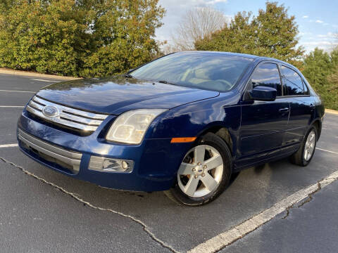 2006 Ford Fusion for sale at FALCONS AUTOMOTIVE LLC in Buford GA