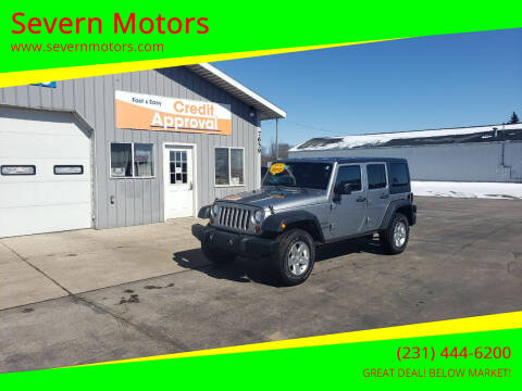 2013 Jeep Wrangler Unlimited for sale at Severn Motors in Cadillac MI