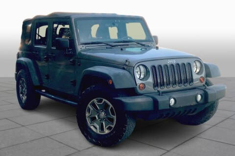 2012 Jeep Wrangler Unlimited for sale at CU Carfinders in Norcross GA