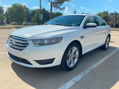2014 Ford Taurus for sale at Safe Trip Auto Sales in Dallas TX